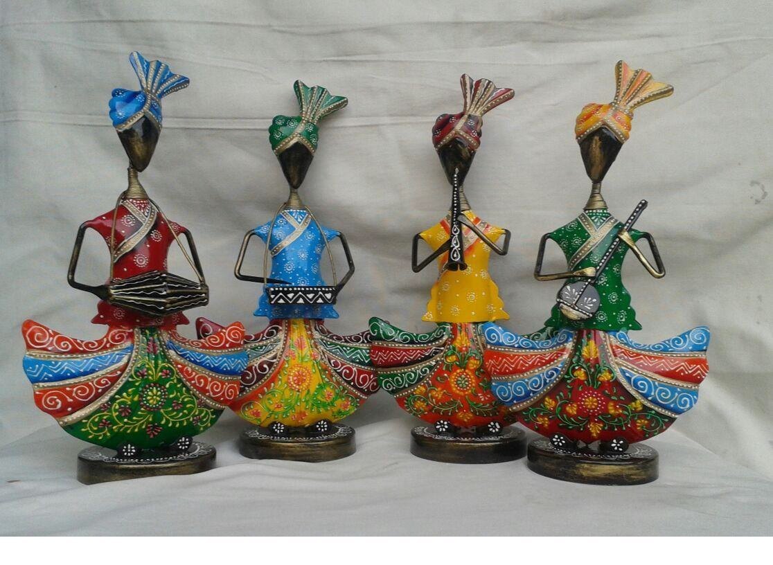 Set of 4 handcrafted antique metal tribal musician dolls playing musical instruments